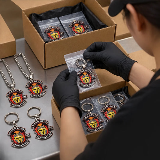 Custom club rings, pendants, buckles and metal gear with an authorized motorcycle club logo finished and prepared for worldwide shipping