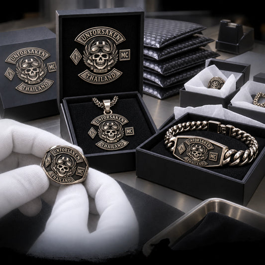 Finished custom motorcycle club jewelry undergoing final inspection before secure worldwide shipping.