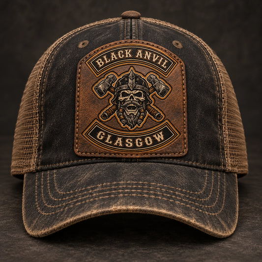 Distressed motorcycle club cap with an antique-brown leather patch.