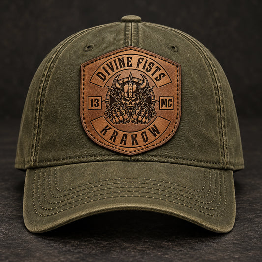 Shield-shaped motorcycle club leather patch on an olive hat.