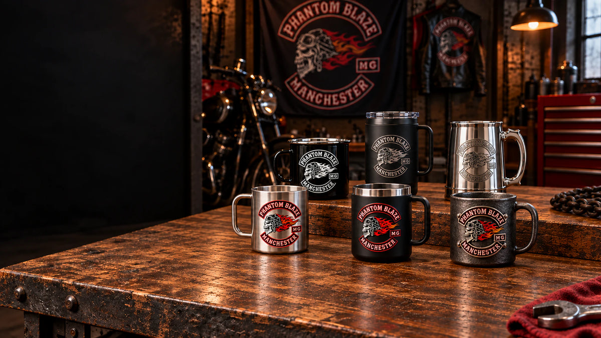 Wide clubhouse hero with six varied metal mugs, dark negative space left displaying an authorized logo for a custom motorcycle club metal mug project.