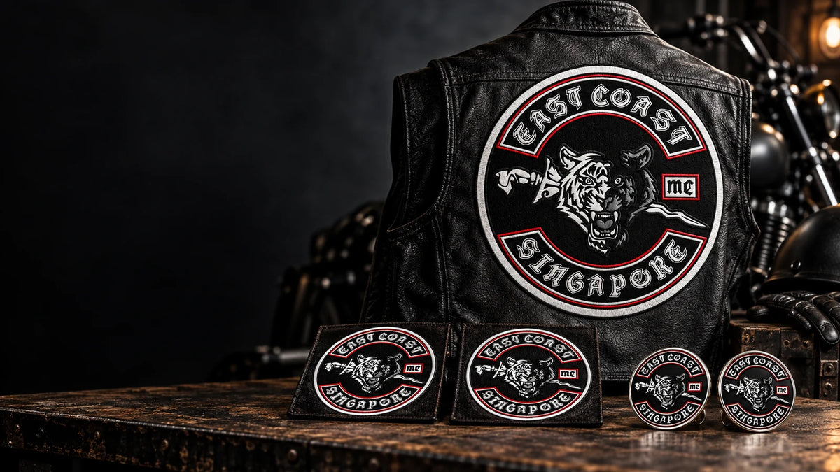 Custom club patches, rockers, pins and badges with an authorized motorcycle club logo displayed as a complete custom collection
