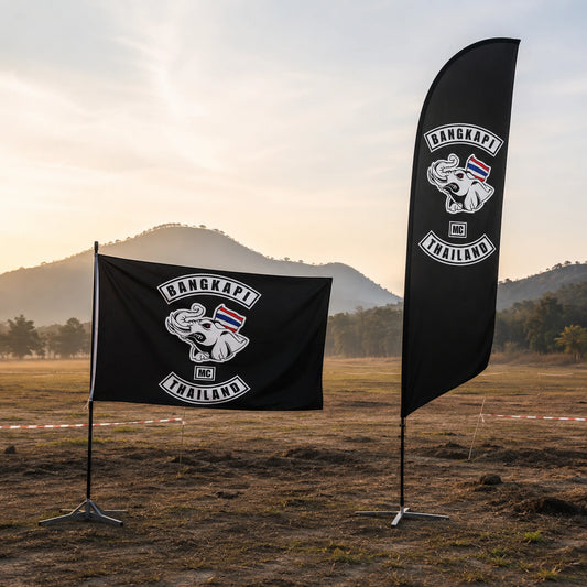 An event crew compares horizontal and vertical custom club flag layouts during rally setup.