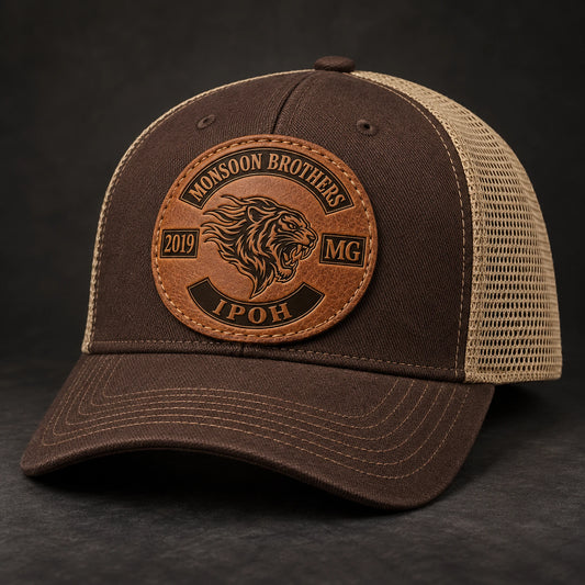 Brown and khaki motorcycle club trucker hat with an approved embossed leather patch.