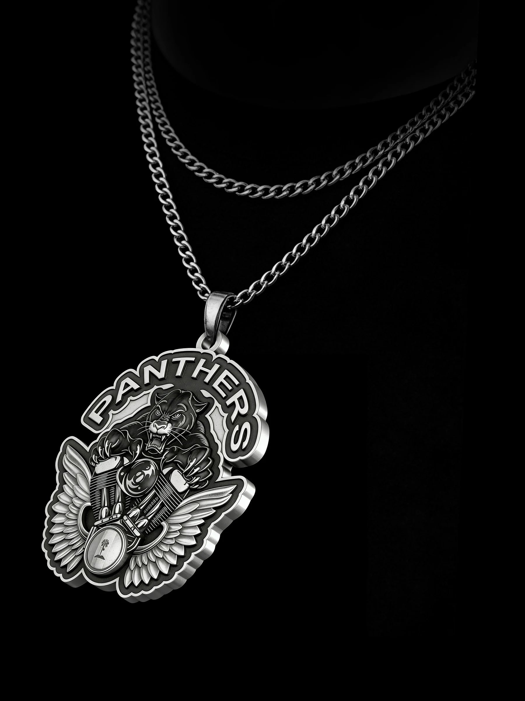 Custom panther and engine motorcycle club pendant craftsmanship reference, raised relief detail