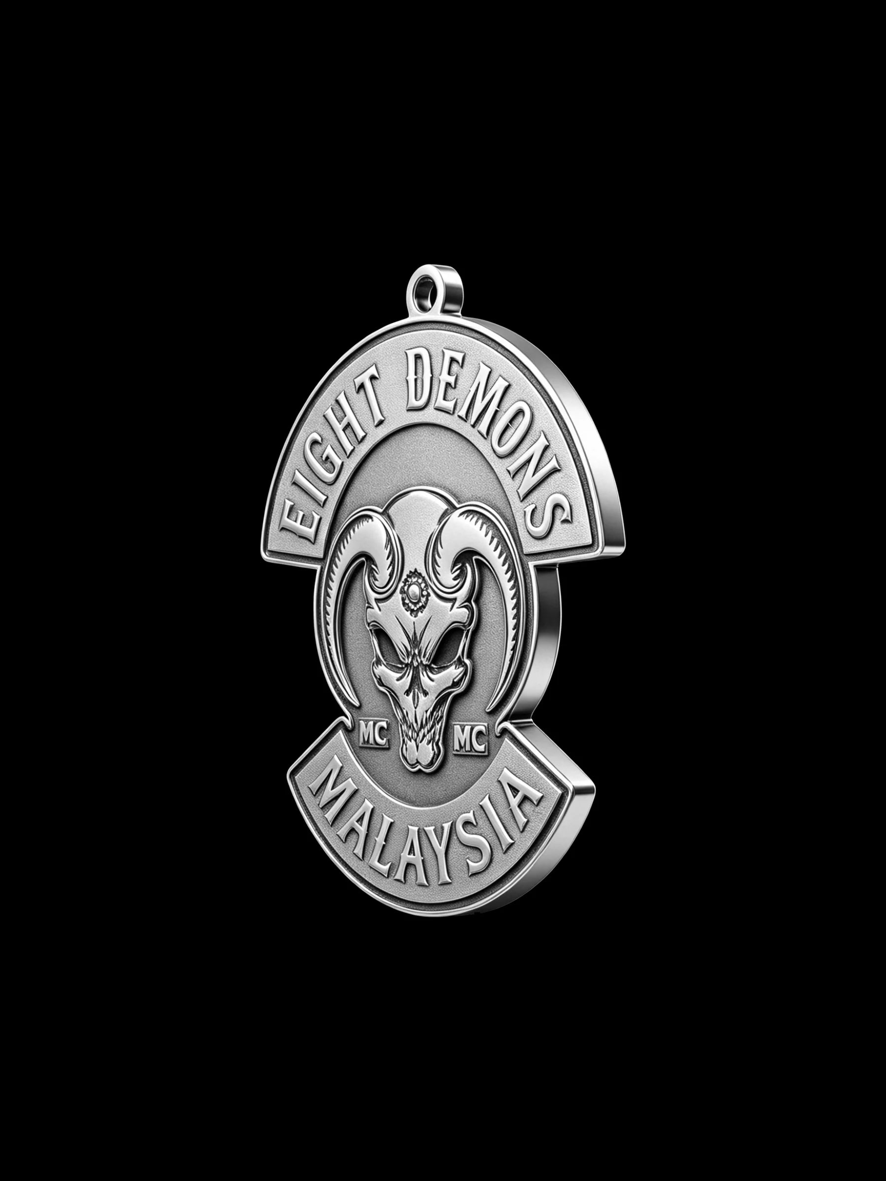 Custom red demon motorcycle club pendant craftsmanship reference, left angle
