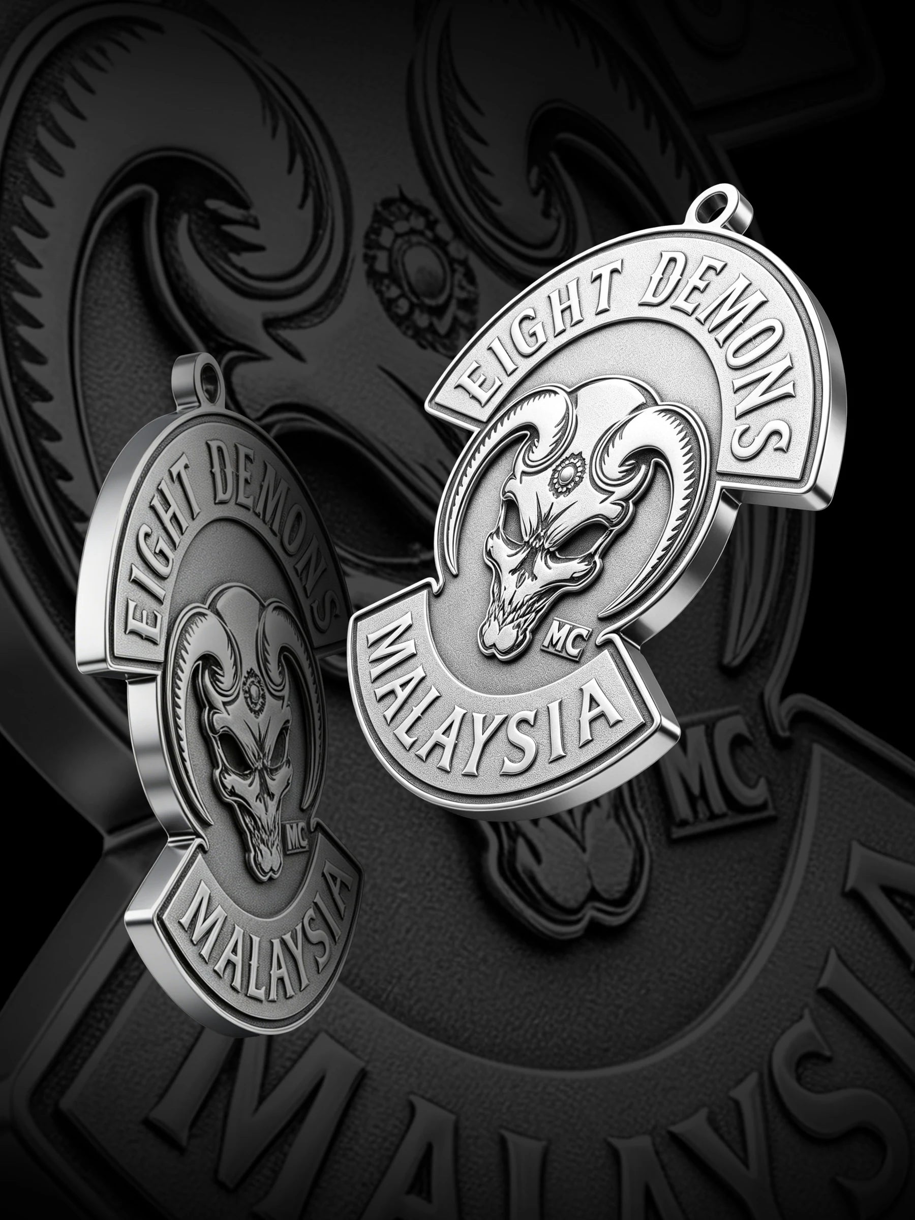 Custom red demon motorcycle club pendant craftsmanship reference, paired display
