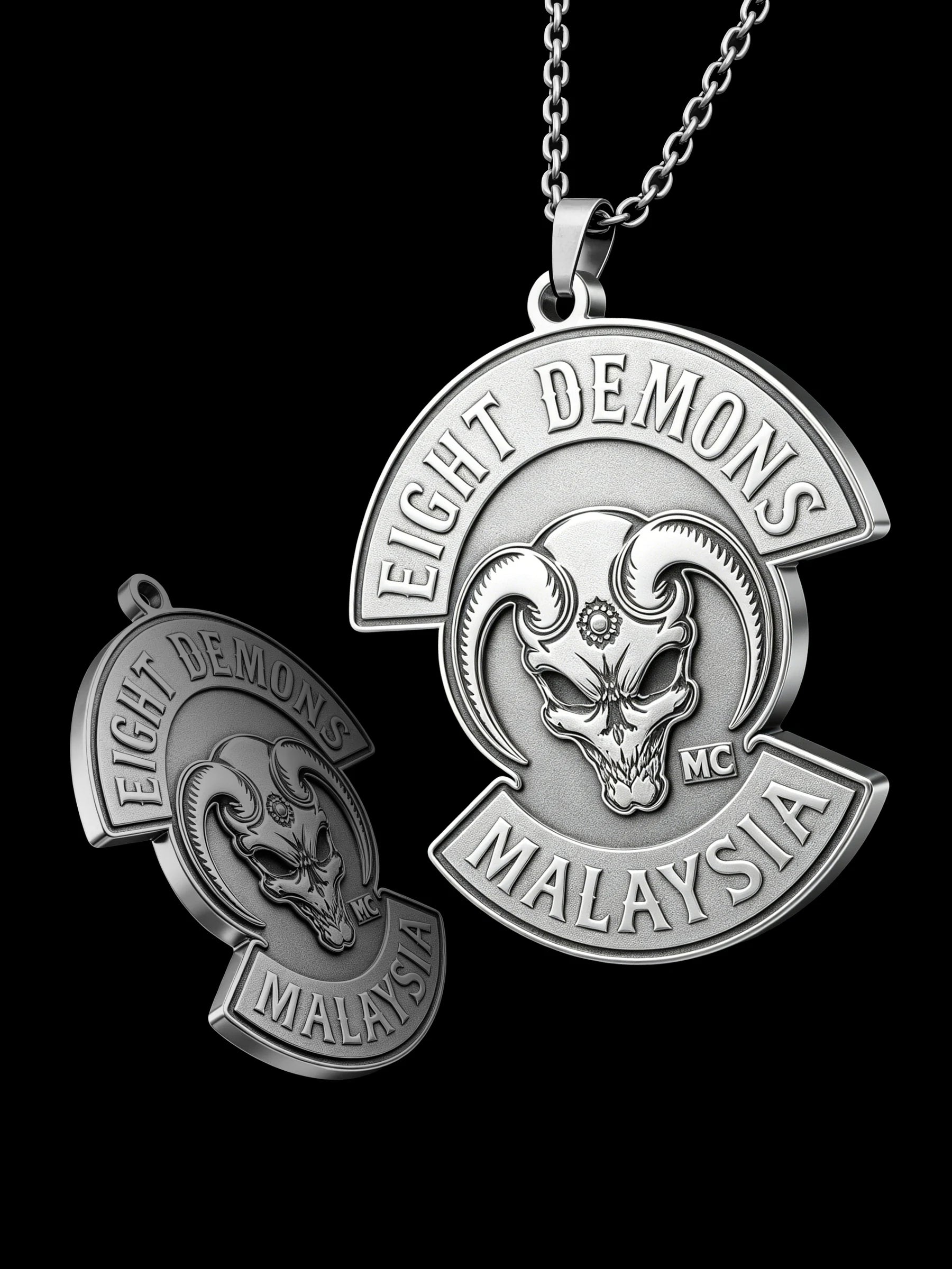 Custom red demon motorcycle club pendant craftsmanship reference, raised relief detail