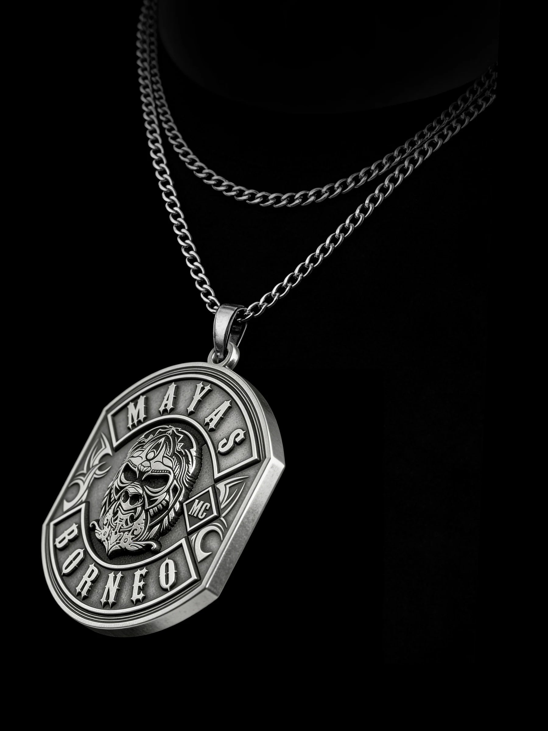 Custom tribal warrior motorcycle club pendant craftsmanship reference, raised relief detail