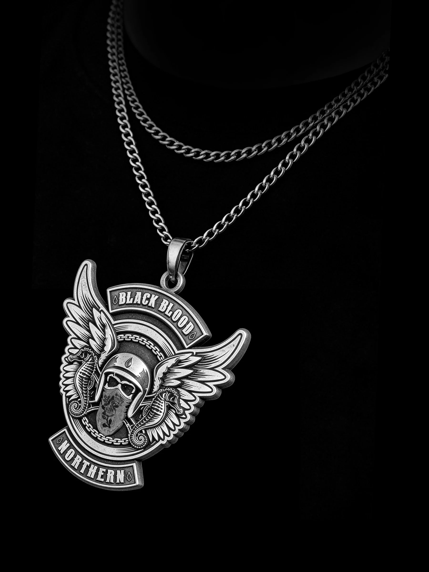 Custom winged masked rider motorcycle club pendant craftsmanship reference, side profile