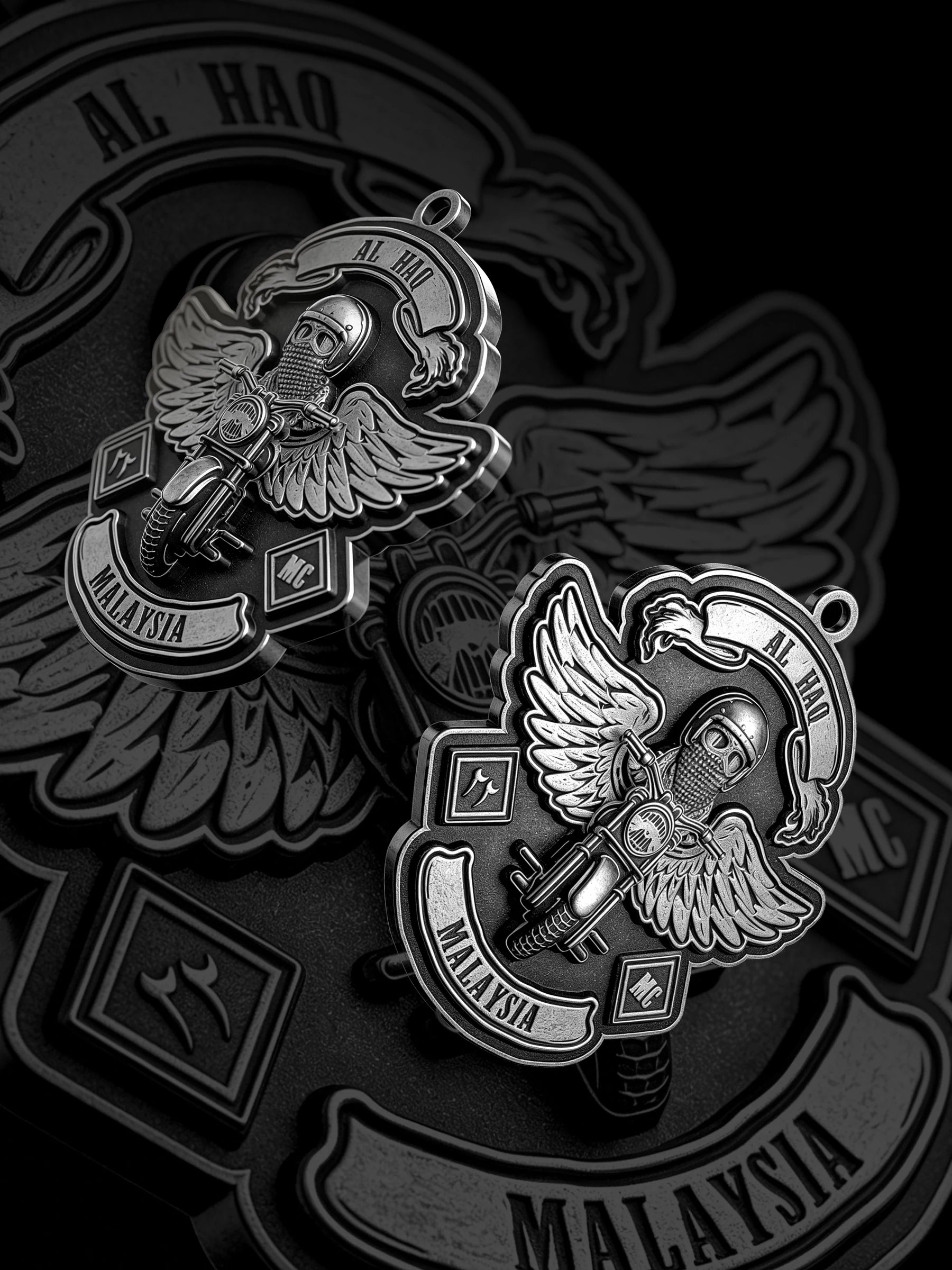 Custom winged motorcyclist motorcycle club pendant craftsmanship reference, paired display
