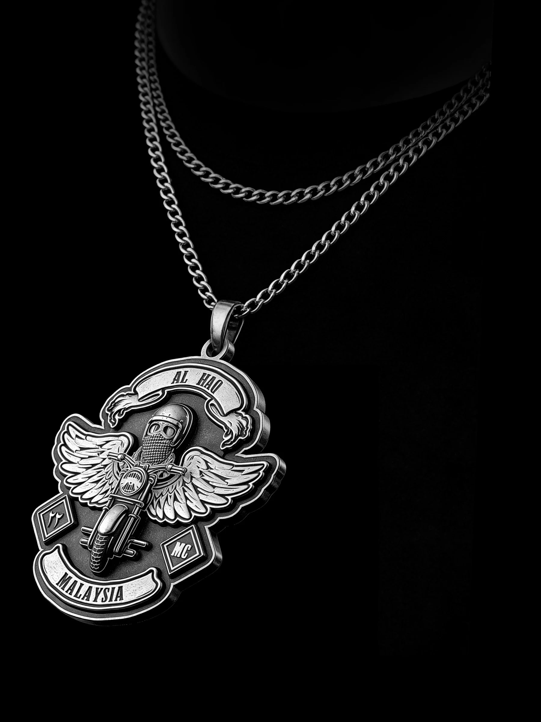 Custom winged motorcyclist motorcycle club pendant craftsmanship reference, raised relief detail