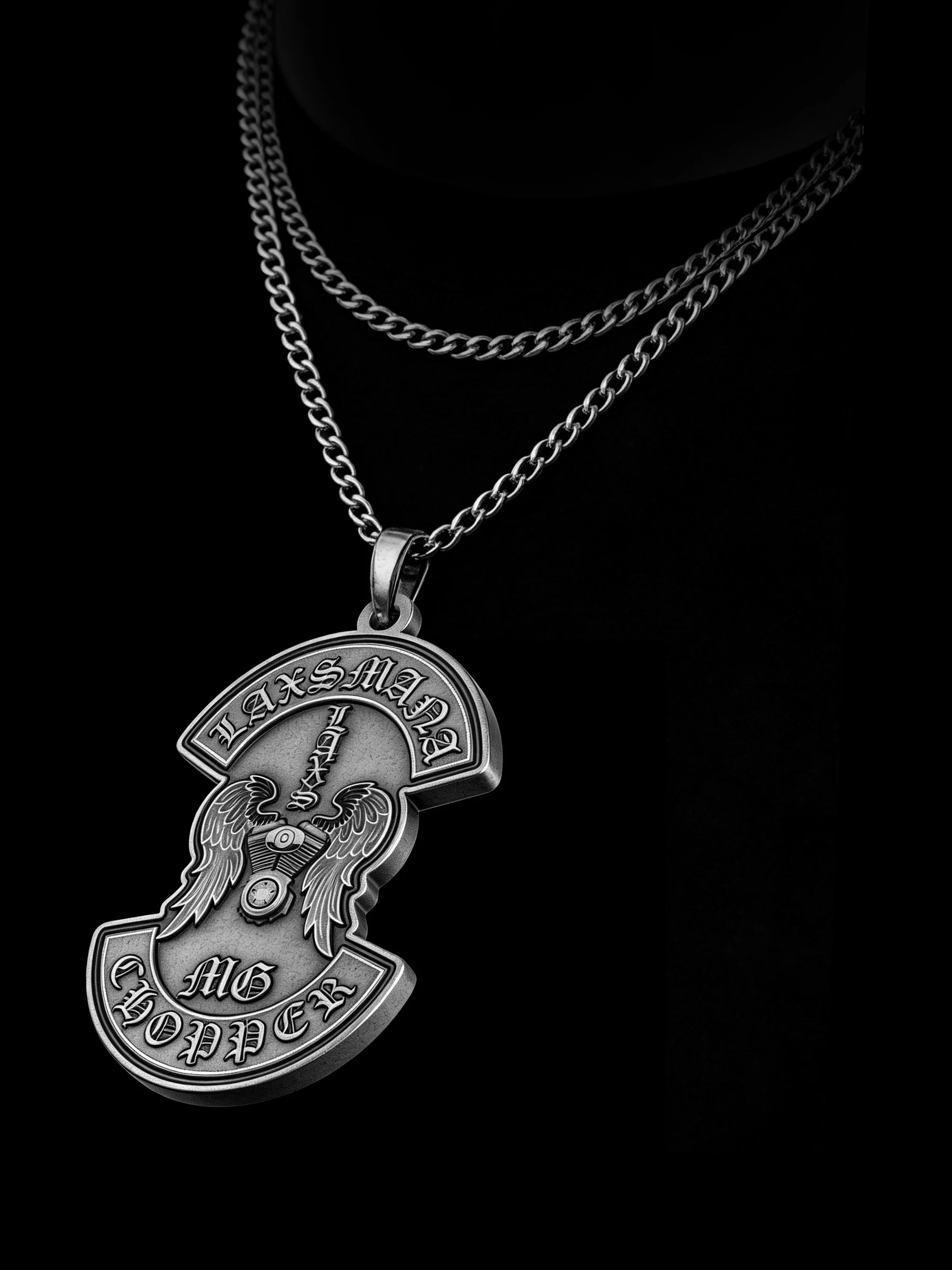 Custom winged sword motorcycle club pendant craftsmanship reference, raised relief detail