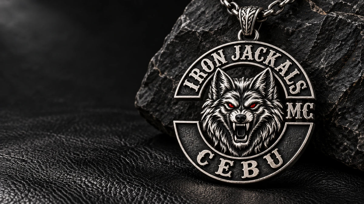 Custom zinc alloy Iron Jackals motorcycle club pendant with sculpted wolf relief and articulated bail.