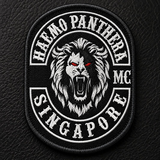 Solid dog-tag-shaped rider memorial patch made from woven textile without openings.
