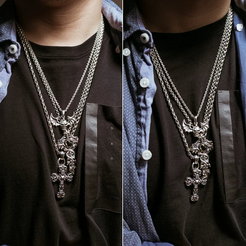 Double dragon cross sterling silver biker pendant worn for scale