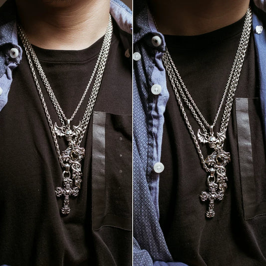 Double dragon cross sterling silver biker pendant worn for scale