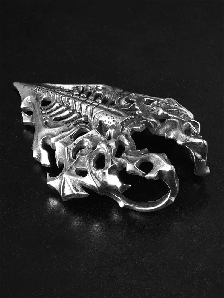 Side profile of sculpted dragon bone shield sterling silver pendant