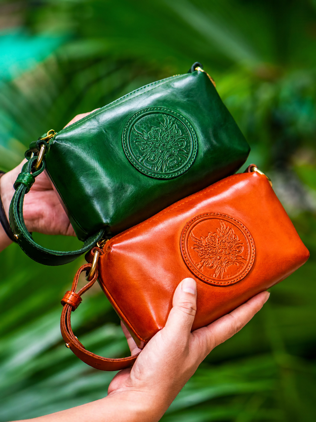 two dragon heritage leather biker clutch wallets held in hand
