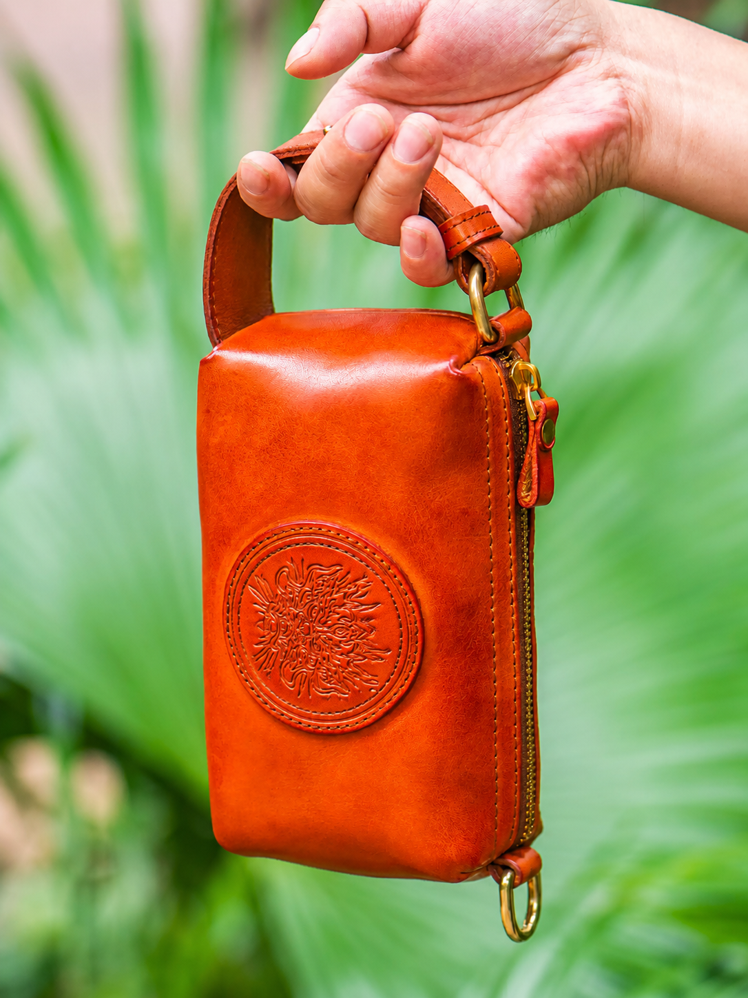 reddish brown leather biker clutch wallet with detachable wrist strap