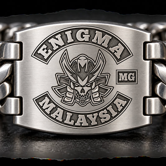 Engraved motorcycle club bracelet plate showing crisp recessed authorized logo details.