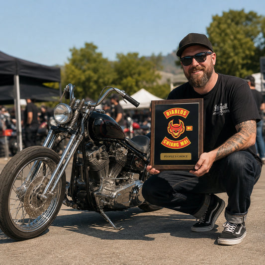 People’s Choice motorcycle show plaque presented beside a custom V-twin motorcycle.