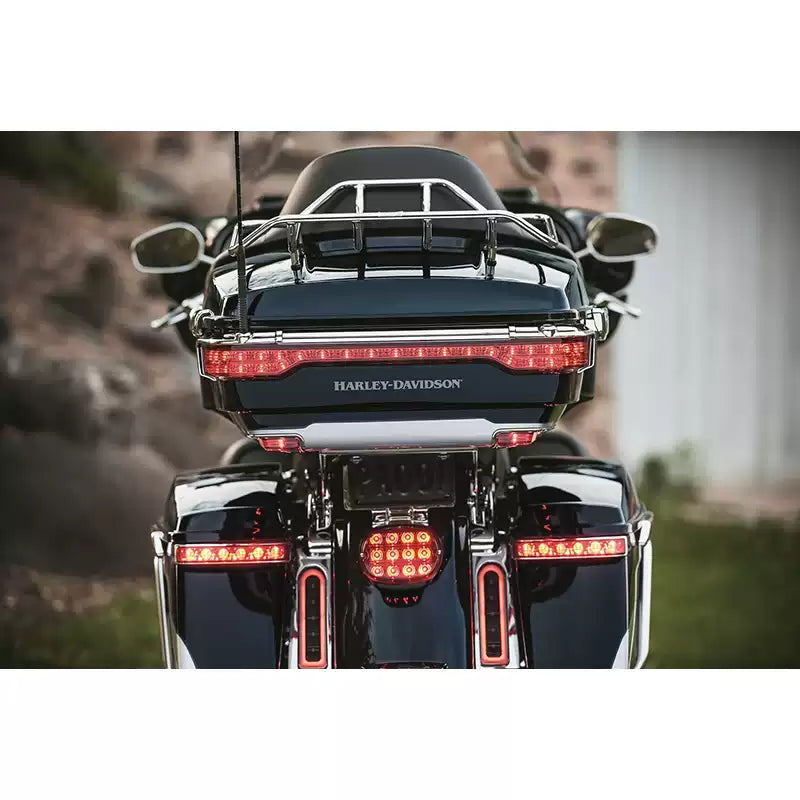 Rear view of Harley Touring motorcycle with illuminated saddlebag gap LED lights