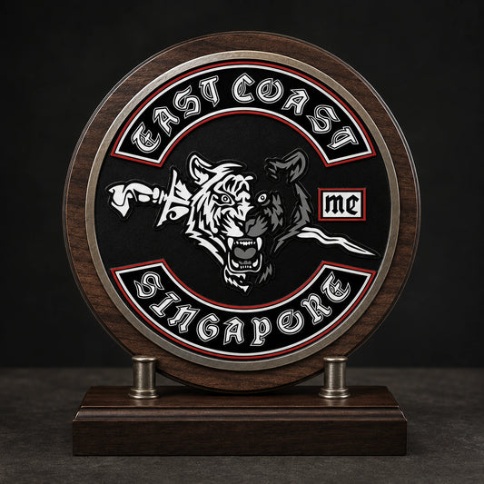 Wood and metal motorcycle club recognition plaque on a presentation pedestal.