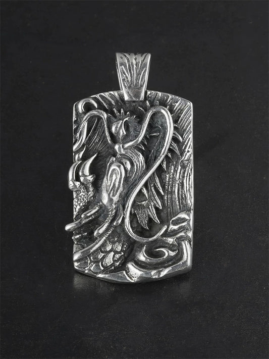 Flying dragon relief sterling silver biker pendant front view