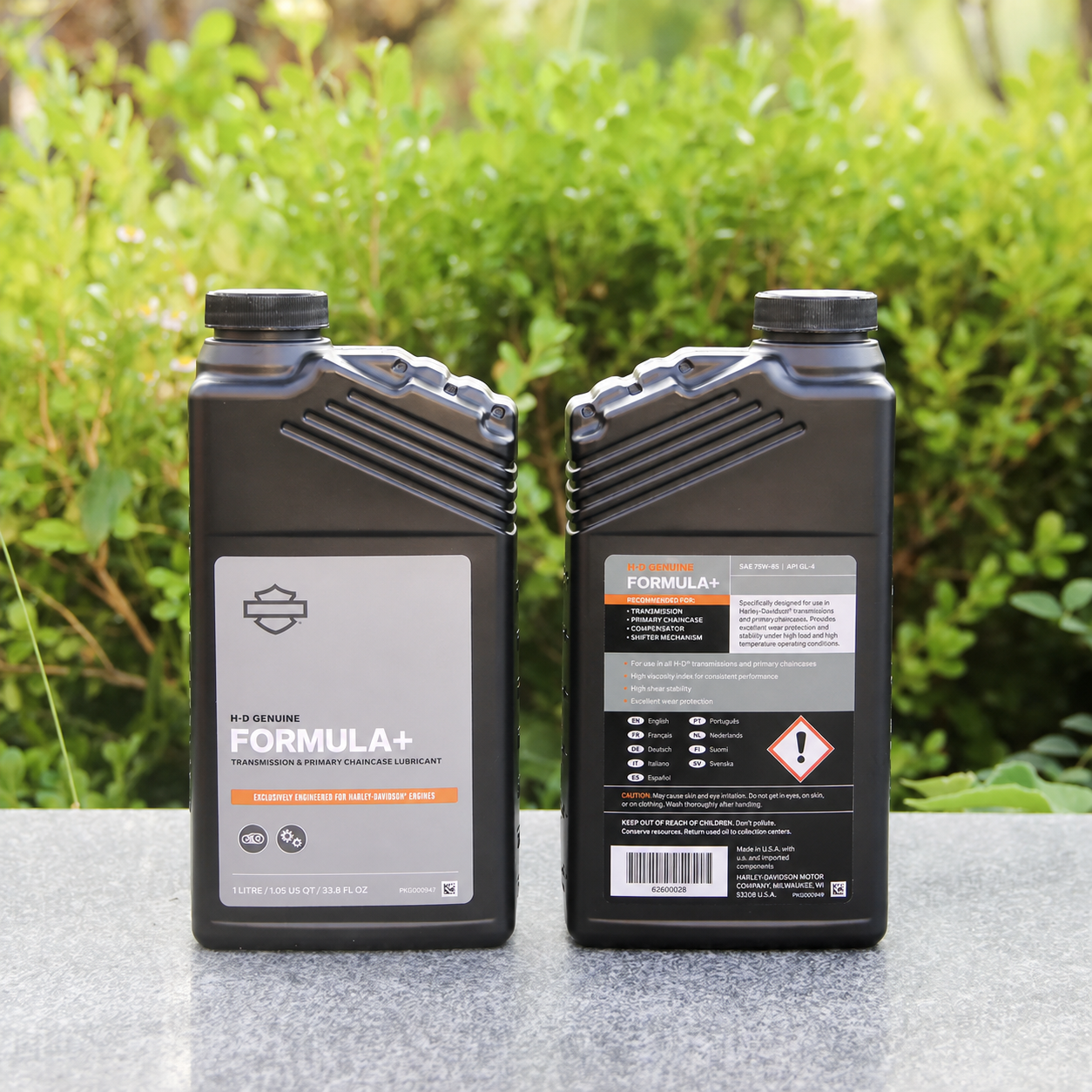 Formula+ gear oil bottle front and back views