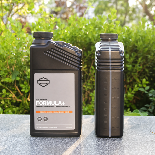 Formula+ gear oil bottle front and side views