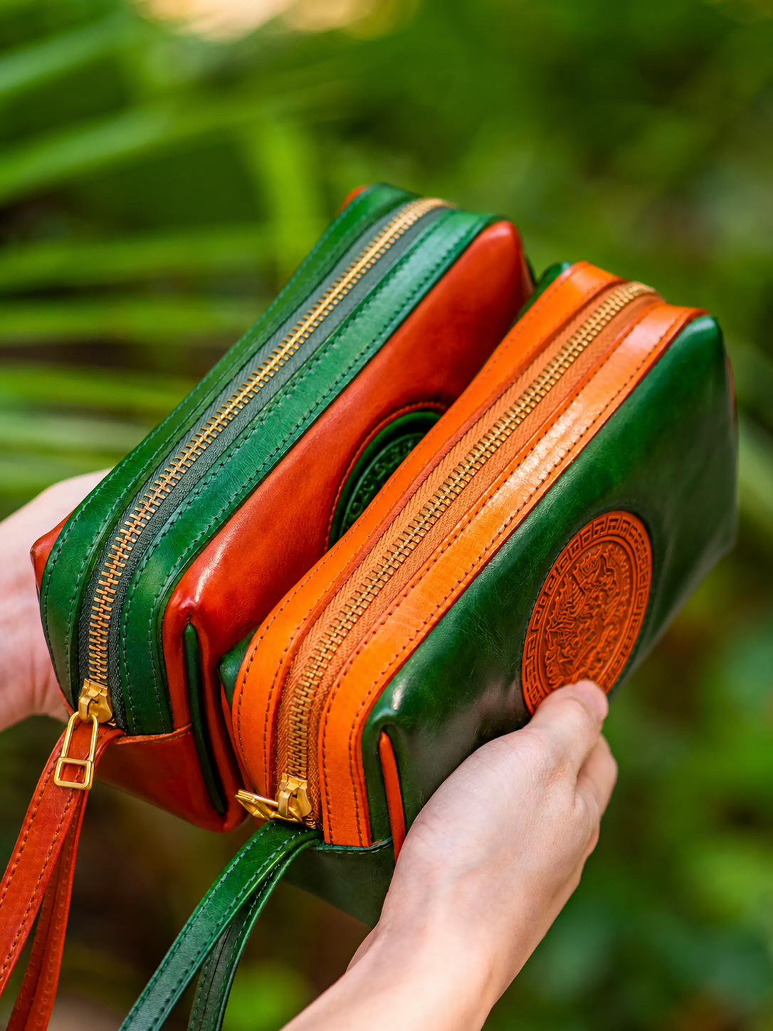 reddish brown and jade green biker clutch wallets zipper side view