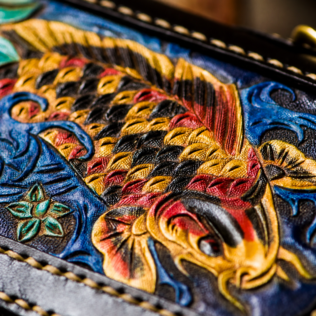 Koi and lotus hand-tooled leather detail