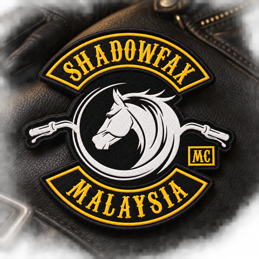 Approved logo translated into solid patch proof shown for a custom motorcycle club patch system in professional design studio.