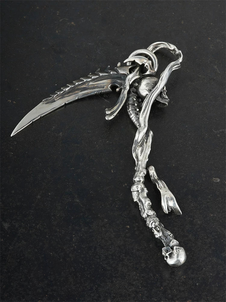 Reverse angle of skeleton grim reaper scythe silver pendant