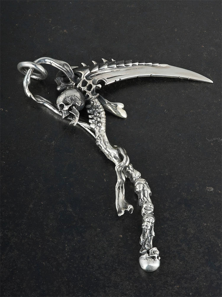 Front view of articulated grim reaper scythe sterling silver biker pendant