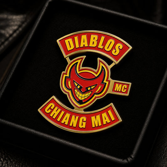 Hard enamel motorcycle club pin with a smooth polished surface.