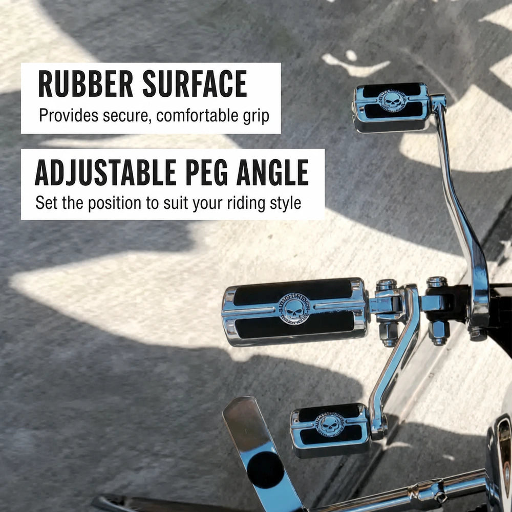 Adjustable chrome skull foot peg with rubber grip installed on a Harley motorcycle