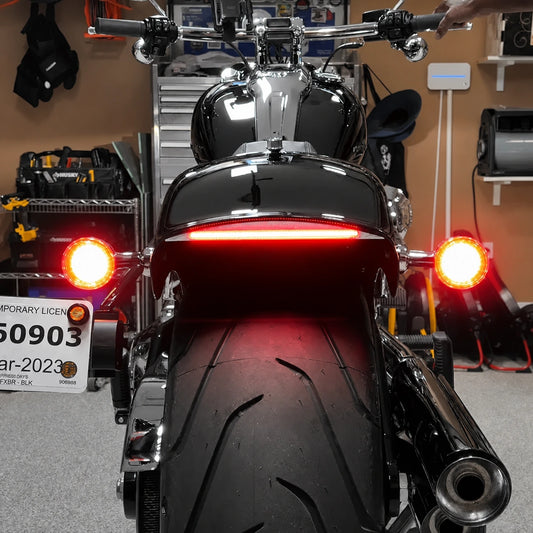 Rear view of Harley Breakout with LED fender tail light and turn signals illuminated
