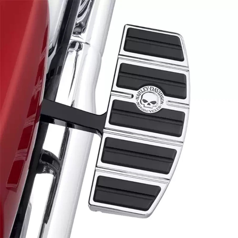 Chrome skull rider footboard installed on Harley motorcycle