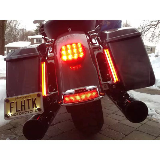 Red rear fender LED light illuminated on a Harley Touring motorcycle