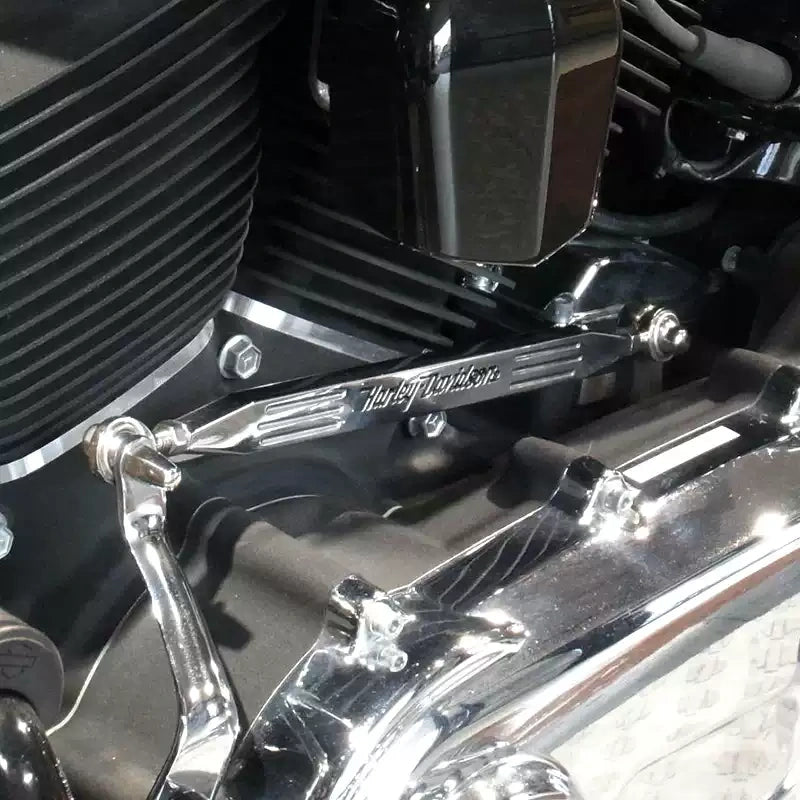 Chrome lettering style shift linkage installed on a Harley motorcycle