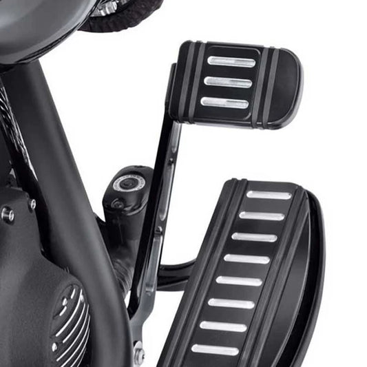Machined Harley brake pedal pad installed on motorcycle