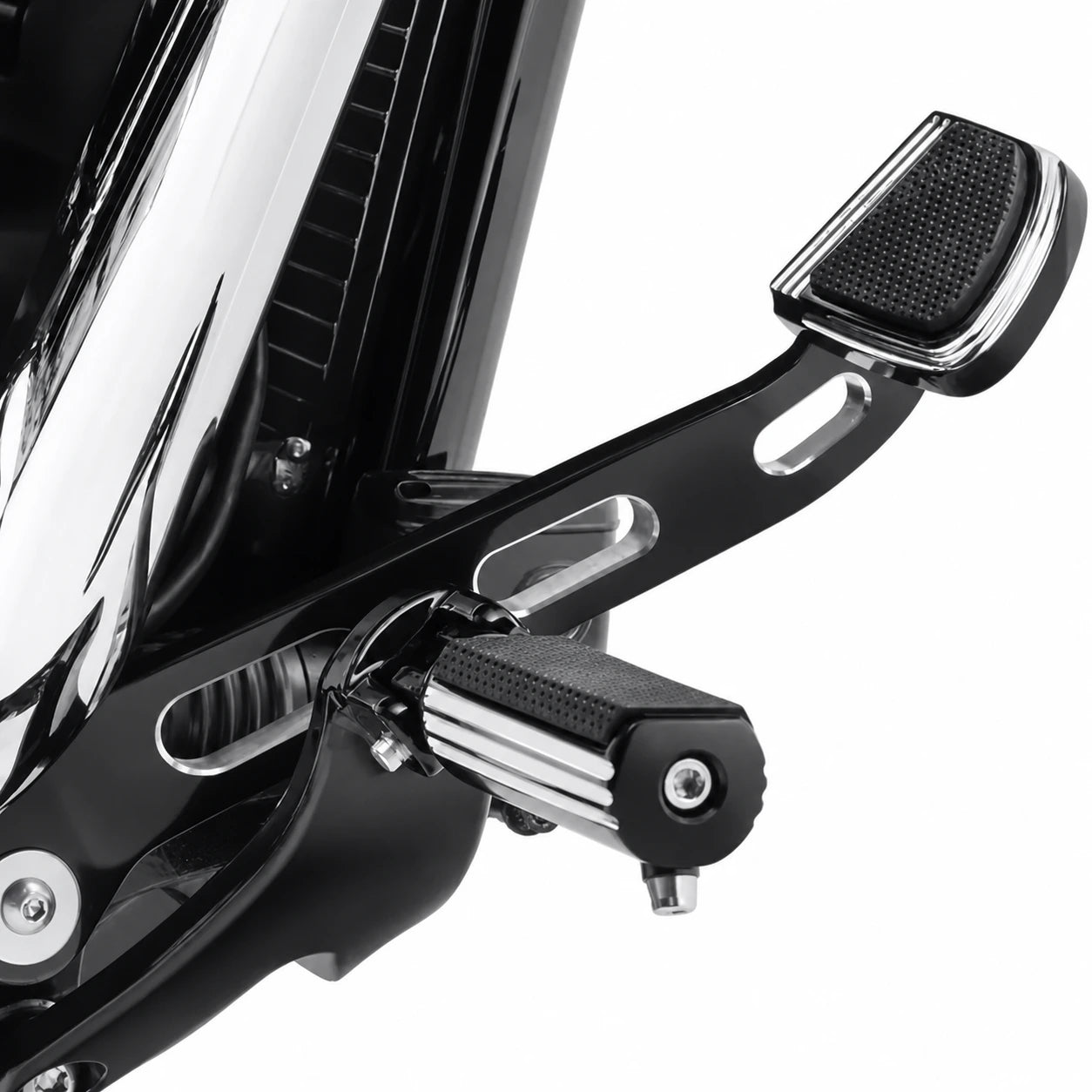 Black and machined forward-control brake lever installed on a Harley Softail