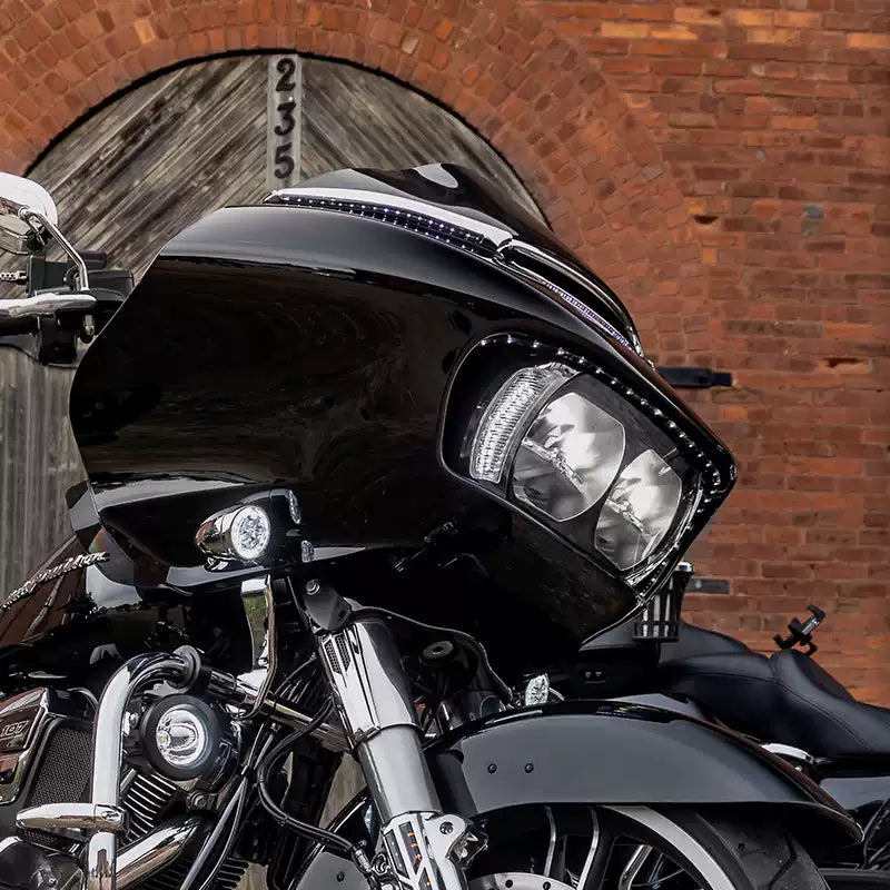 Side view of LED running and turn signal inserts installed on a Harley Road Glide fairing