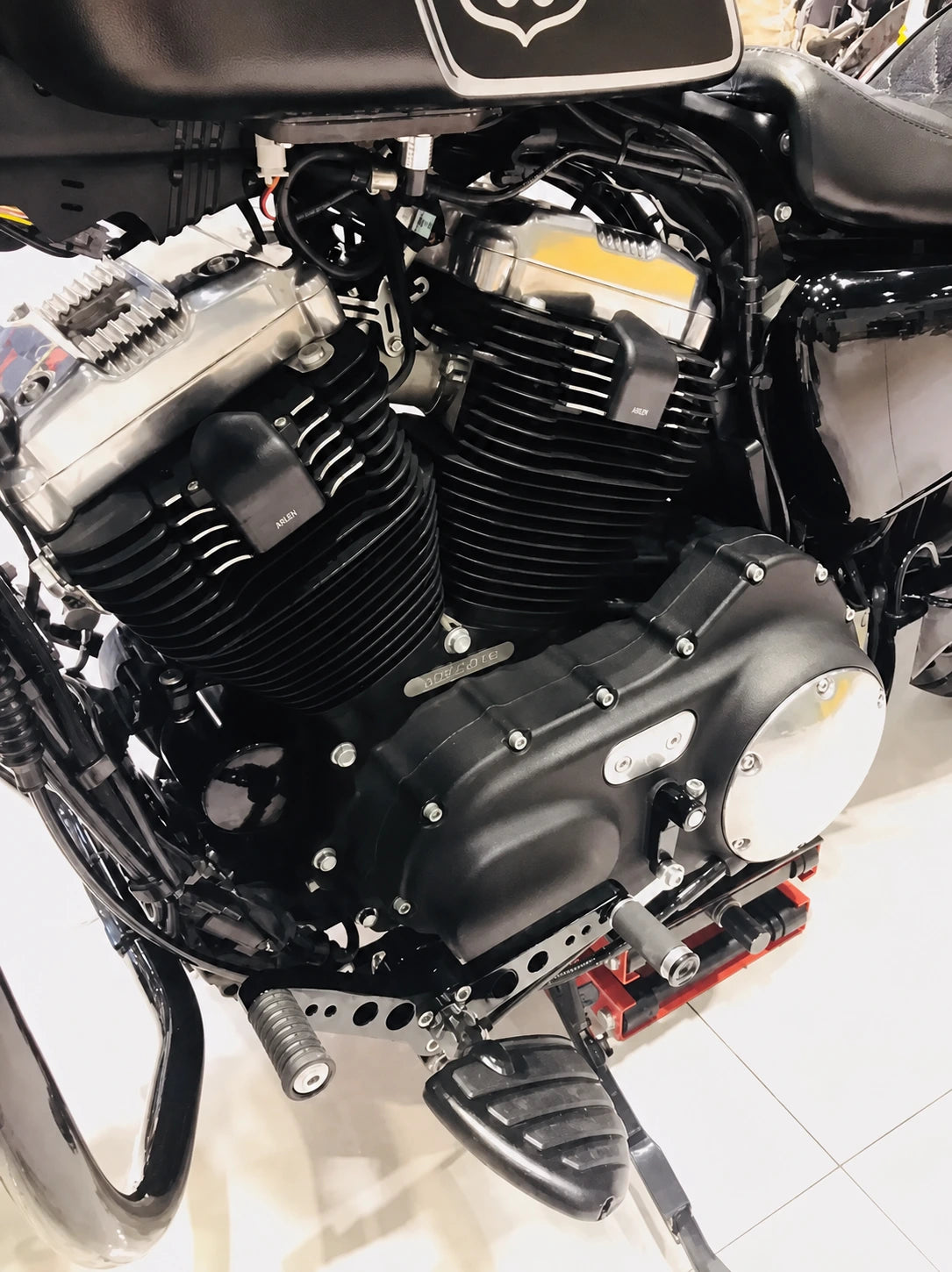 Harley Sportster forward-control shift lever assembly installed