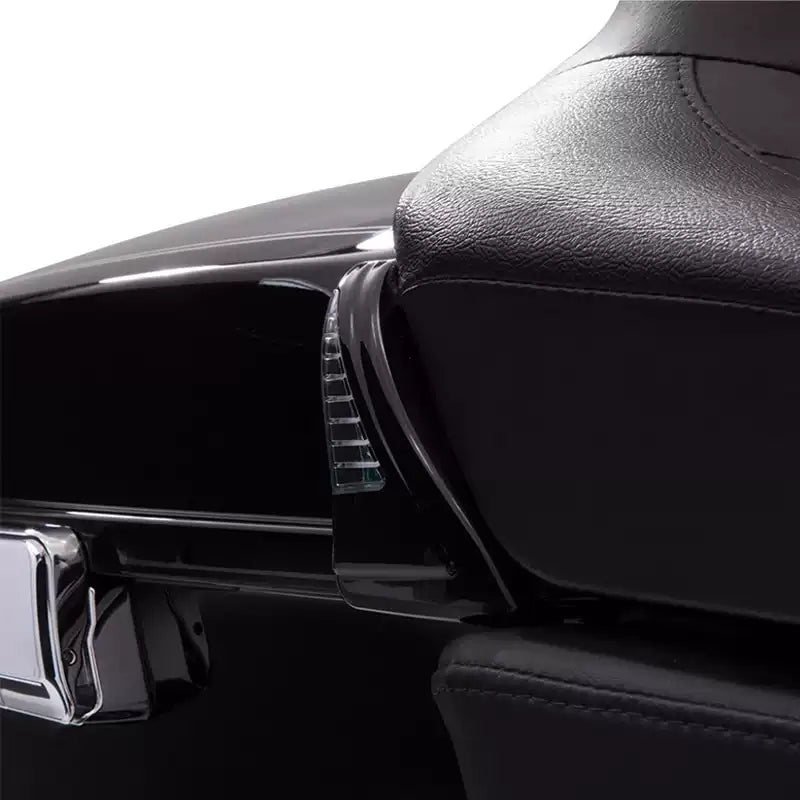 Clear LED side light installed beside a Harley Touring Tour-Pak passenger backrest