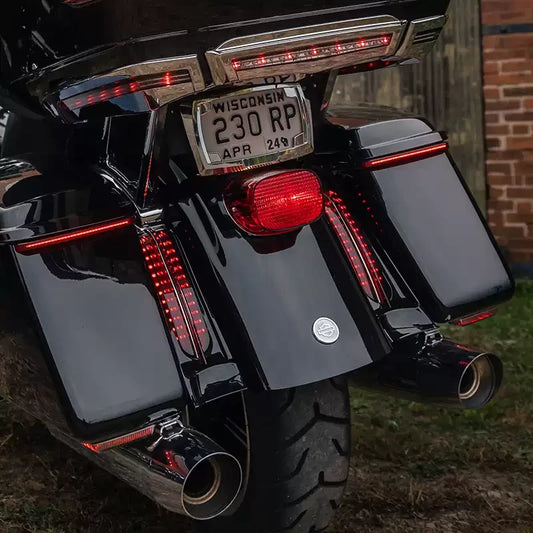 Rear view of Harley Touring motorcycle with filler panel LED lights illuminated