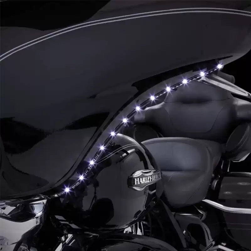 Close-up of white LED eyebrow light strip on Harley Touring fairing
