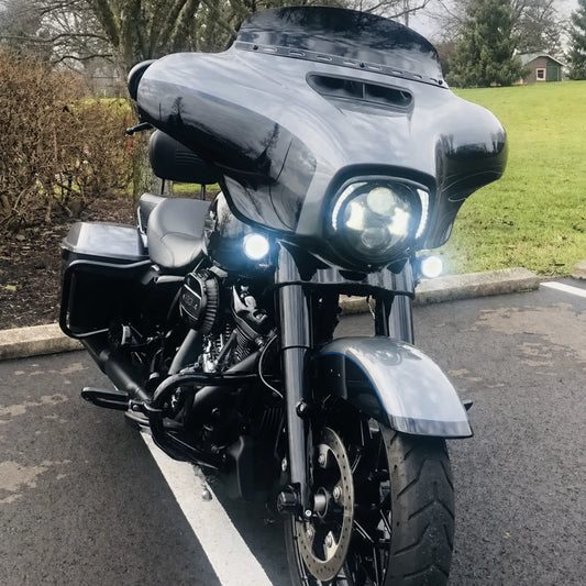 Harley Touring motorcycle with LED headlight trim illuminated